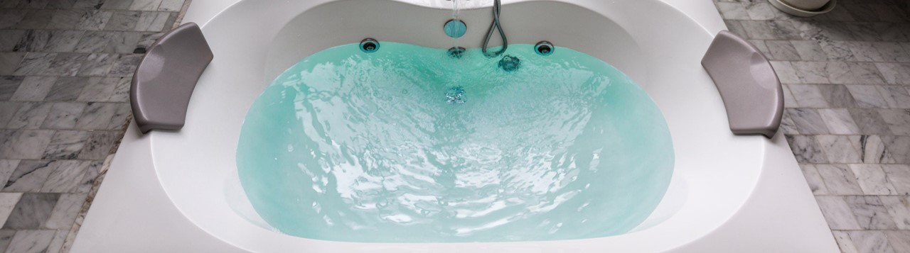Bath tub full of hot water