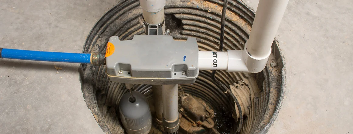 Sump pump system installed inside basement pit