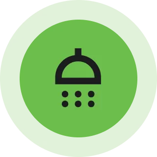 Green showerhead icon on circular background